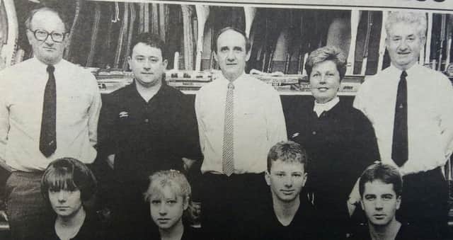 Huey and Henderon staff marking 25 years in business in 1993: John Watt, Arthur McMullan, James Shaw, Reba Henderson, George Henderson; Debbie Kelly, Gail Campbell, Fergal Kealy and Collin Lafferty.