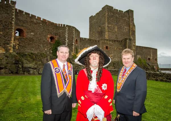 Pictured at the launch of the Royal Landing at Carrickfergus Castle with King William in March 2017 are Deputy Grand Master of the Grand Orange Lodge of Ireland, Harold Henning (right), and chairman of the Carrickfergus Historical Re-enactment Group, Darren McAllister