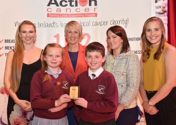 LOCAL SCHOOLS SCOOP AWARDS: Zoe Salmon, Jennifer Morton Centra, and Rebecca Dalzell Action Cancer along with Ava Hanna, Gillian Dunlop (Teacher) and Leon Gilbert pictured at the annual Health Action Awards, where Largymore Primary School, Lisburn scooped a Gold award. The Awards are part of Action CancerÃ¢Â¬"s unique Health Promotion Programme, sponsored by Centra, as part of the brandÃ¢Â¬"s Ã¢Â¬ÃœLive WellÃ¢Â¬" initiative. Fifty schools across Northern Ireland picked up awards for their innovative approach to good health promotion across various areas including, providing healthy meal options, promoting healthy snacks and water, encouraging extra-curricular exercise programmes and running cancer awareness initiatives. A full list of the 2017 award winners is available at www.actioncancer.org
