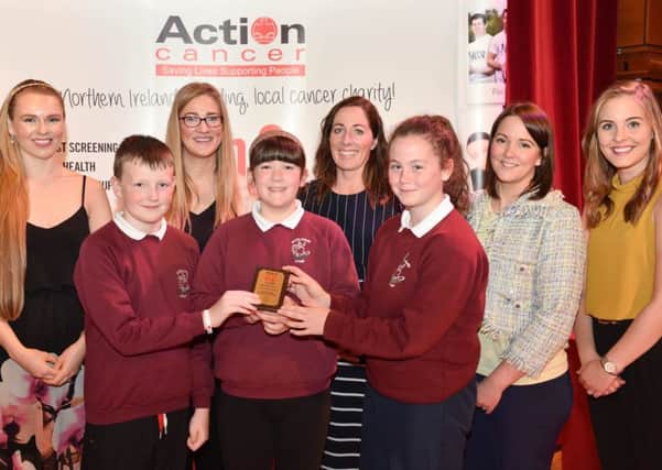 LOCAL SCHOOLS SCOOP AWARDS: Zoe Salmon, Jennifer Morton Centra, and Rebecca Dalzell Action Cancer along with Ryan Burke, Mrs Bradley (Teacher), Molly McAuley, Fiona Kennedy (Teacher) and Rhiannah O'Neill pictured at the annual Health Action Awards, where St Columba's Primary School, Straw scooped a Gold award. The Awards are part of Action CancerÃ¢Â¬"s unique Health Promotion Programme, sponsored by Centra, as part of the brandÃ¢Â¬"s Ã¢Â¬ÃœLive WellÃ¢Â¬" initiative. Fifty schools across Northern Ireland picked up awards for their innovative approach to good health promotion across various areas including, providing healthy meal options, promoting healthy snacks and water, encouraging extra-curricular exercise programmes and running cancer awareness initiatives. A full list of the 2017 award winners is available at www.actioncancer.org