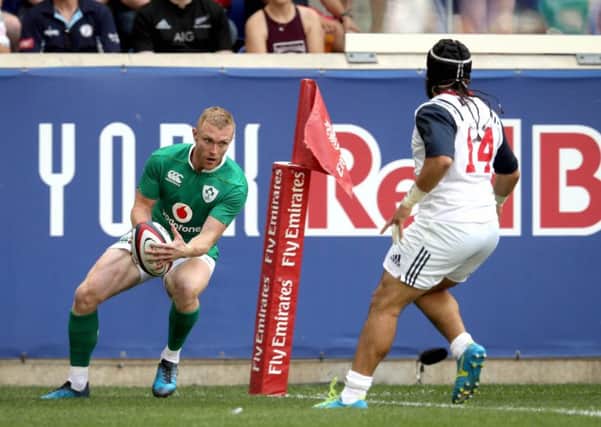 Ireland's Keith Earls scores the first try of the game against USA