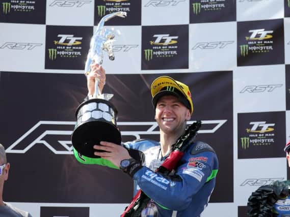 Ian Hutchinson claimed TAS Racing's maiden win in the Superbike class at the TT since 2008.