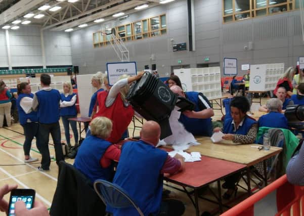 The opening of the first ballot box at the count centre for the Foyle constituency on Thursday night