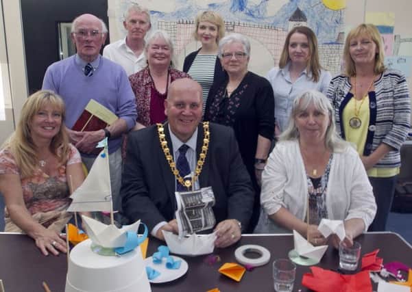 Mayor and Mayoress for Mid and East Antrim, Councillor Paul Reid and Carol Reid getting festivities underway at the Carnlough Industrial Heritage Hub event on Saturday.
