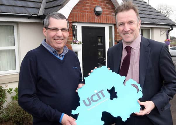 Rev Robert Ginn from the Elim Church and Phelim Sharvin, UCIT Director, at an affordable housing scheme which UCIT helped fund in New Mossley. Photo by Freddie Parkinson / Press Eye Â©