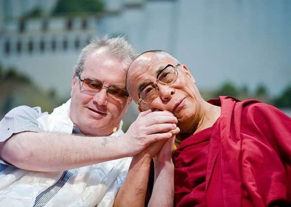 Richard Moore with the Dalai Lama during a previous visit to the city.