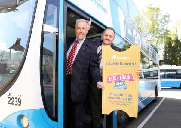 Councillor Uel Mackin (left), Chairman of Lisburn and Castlereagh City Council's Development Committee, and Jim McCauley, Service Delivery Manager, Translink, encouraging local people to make use of bus and train services.