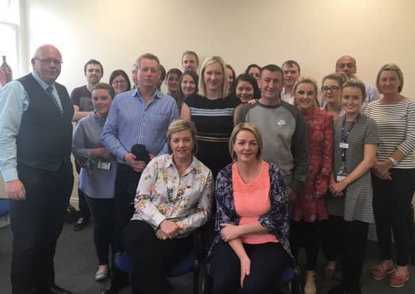 Pictured are the daughters of the late Dermot Maguire, with members of the Service user group of the Southern Health and Social Care Trust Addiction Service, So Hope and Members of the Community Addiction Team.