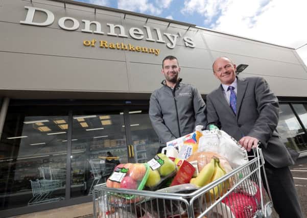 Pictured are (l-r) Connor Donnelly, Owner of Donnellys of Rathkenny and Philip Smyth, Business Manager at Danske Bank'"s North Business Centre