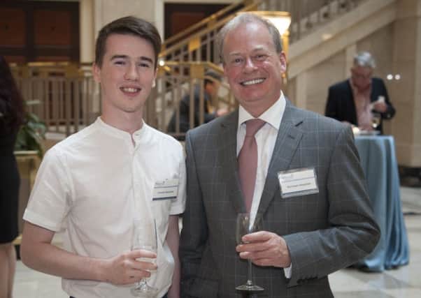 Norman Houston and his son Connor pictured at a function in Washington.