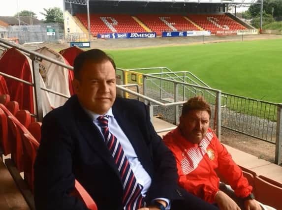 Glasgow Rangers' Phil Cowen (left) with Portadown manager Niall Currie at Shamrock Park.