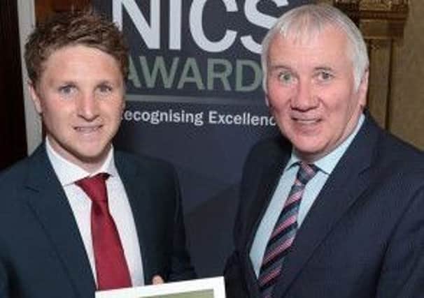 Horticulturist Colin McKnight (left) receives his Northern Ireland Civil Service Professional of the Year Award 2017 from Head of the Northern Ireland Civil Service, Sir Malcolm McKibbin.