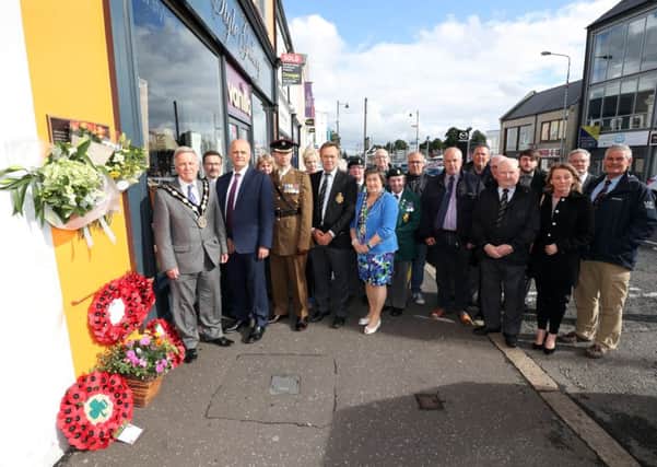 Former Mayor, Councillor Brian Bloomfield MBE; Jim Rose, Director of Lesiure and Community Services; Lt Col Franland, Commanding Officer of NI Garrison Support Unit; Raymond Corbet, President of Royal British Legion; former Mayoress; fellow elected members, and members of the Lisburn Branch of the Royal British Legion and Ulster Defence Regiment.