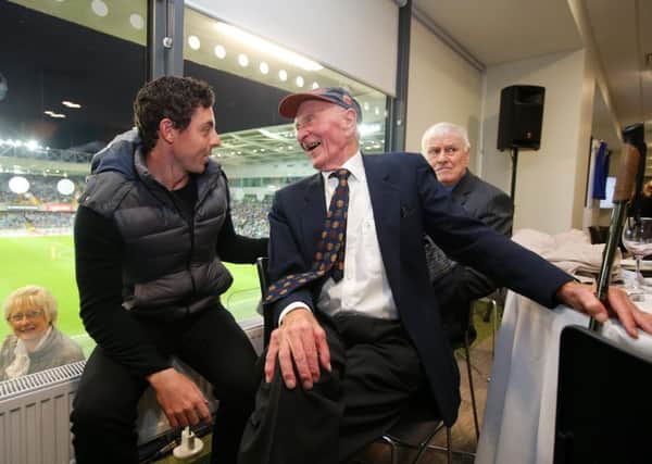 Rory McIlroy with Harry Gregg
