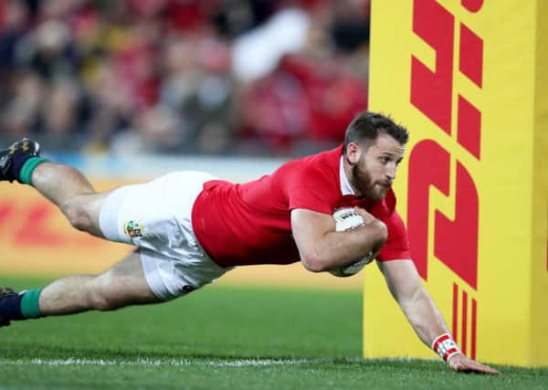 Lions' Tommy Seymour scores their opening try against Hurricanes