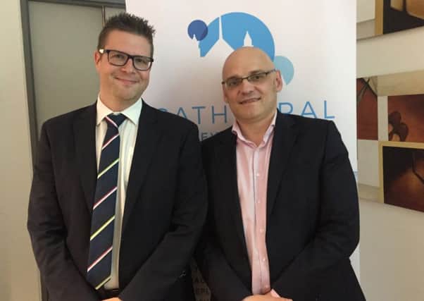 Caption:  Professor Jonathan Moore (right) with Wayne Watson, Optometrist and store director at Specsavers Banbridge at the first post-op cataract management training session with Cathedral Eye Clinic.