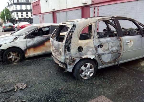 The burnt out cars at Latharana flats in the Riverdale area of Larne