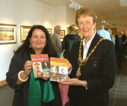 Pictured launching the Arts and Events Summer Guide for Flowerfield Arts Centre and Roe Valley Arts and Cultural Centre are Desima Connolly, Cultural Facilities Development Manager and The Mayor of Causeway Coast and Glens Borough Council, Councillor Joan Baird, OBE.