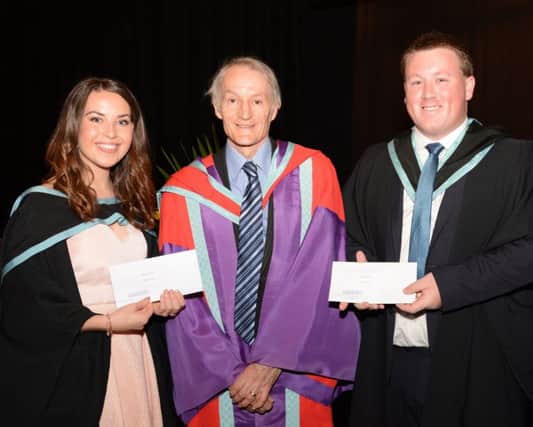 Rachael Jess (pictured with fellow winner Jason Price) receiving their awards from Dr Clifford Boyd, who recently retired as Vice Principal of Stranmillis and was the Chief Guest Speaker at the Awards Celebration event.