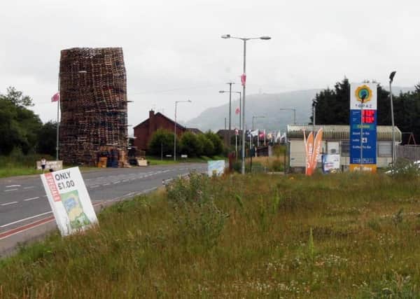 A controversial bonfire site at Love Lane near a petrol station at Prince Andrew Way in Carrick.