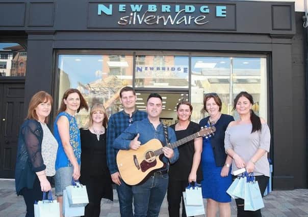 Pictured collecting their prizes at the Arthur Street store in Belfast are Edna Brown, Caroline Handford, Ciara Donnelly (Newbridge Silverware Store Manger) Stuart Robinson (Cool FM), Country music star Eddie Carey, overall competition winner Debbie Booth, Margaret Dilworth (Newbridge Silverware) and Ciara Keenan as they collected their prizes at the Newbridge Silverware store in Arthur Street, Belfast.