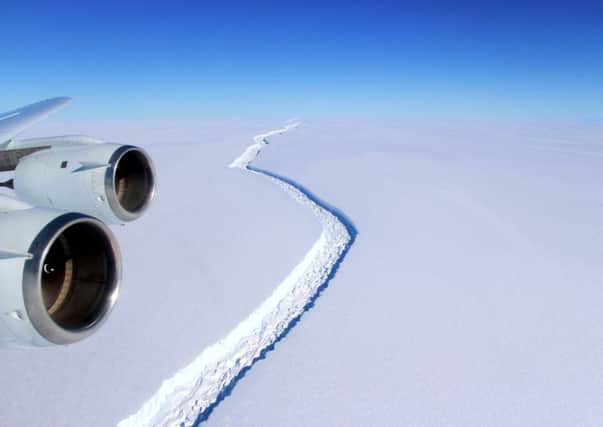 Undated handout file photo issued by NASA of a rift in an Antarctic ice shelf where one of the largest icebergs on record has broken away, scientists have announced. PRESS ASSOCIATION Photo. Issue date: Wednesday July 12, 2017. Researchers who have been monitoring a huge crack in the Larsen C Ice Shelf, which had left a vast iceberg more than a quarter the size of Wales "hanging by a thread", say the rift has finally completed its path through the ice. See PA story ENVIRONMENT Ice. Photo credit should read: John Sonntag/NASA/PA Wire

NOTE TO EDITORS: This handout photo may only be used in for editorial reporting purposes for the contemporaneous illustration of events, things or the people in the image or facts mentioned in the caption. Reuse of the picture may require further permission from the copyright holder.