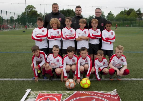 The Brightstars FC under 11 squad with coaches Stephen Gallagher, JP Walsh and Dan Glenn.