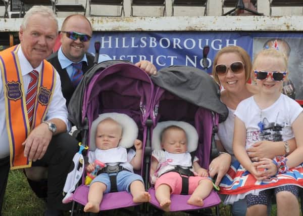 Twins Bella and Bonnie Verner pictured at the Hillsborough Twelfth with their parents David and Susan and their sister Katie and grandfather Walter Boal (Deputy District Master of Ballinderry LOL No 3).