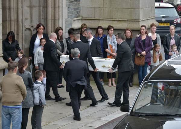 The small white coffin of six-year-old Donnacadh Ã¢Â¬ÃœDonnyÃ¢Â¬" Maguire is carried into St EugeneÃ¢Â¬"s Cathedral for Requiem Mass on Saturday morning. The St EugeneÃ¢Â¬"s Primary School pupil died following a tragic accident on Tryconnell Street on Tuesday 11th July last. DER2817GS050