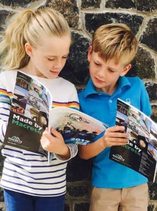 Isla (9) & Noah (8) McClelland, from Coleraine, have got their hands on the programme for next week's SuperCupNI. The 35th anniversary publication is available at local newsagents and other outlets in the area.