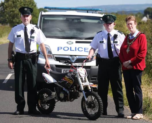 The Mayor of Causeway Coast and Glens Borough Council, Councillor Joan Baird OBE with PSNI representatives as they launch a new campaign on the dangers of illegal scrambler use.