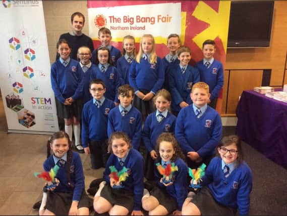 Macosquin Primary School   Year 6 pupils competed in the Microbot Challenge taking place at The Big Bang Science Fair at Ulster University, Jordanstown Campus. They are pictured with their teacher, Mr Harris, at the Microbot Challenge.