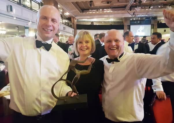 The McCulla team - Brian Beattie (Operations Director), Carol Thompson (Finance Director) and Ashley McCulla (Managing Director) - celebrating their Motor Transport Awards success.