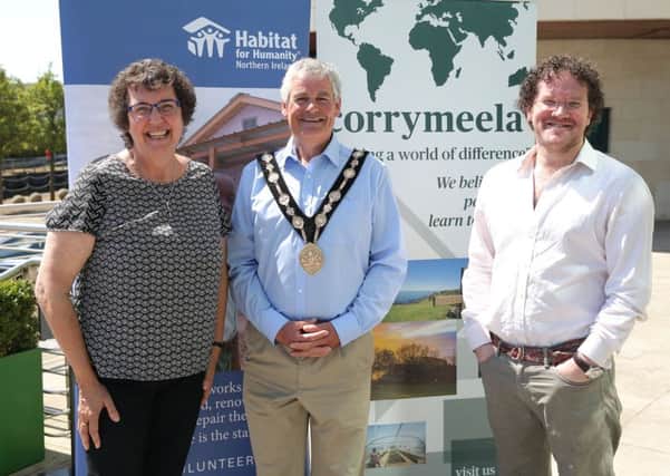 Jenny Williams, Chief Executive of Habitat for Humanity Northern Ireland; Councillor Tim Morrow, Mayor of Lisburn & Castlereagh; and PÃ¡draig " Tuama, Leader at The Corrymeela Community.