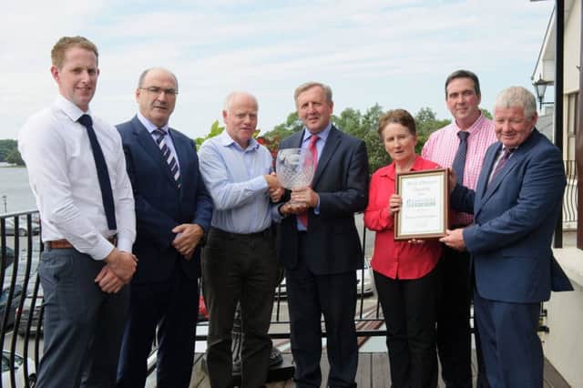 Seamus & Gerard Quinn, Ardboe, won the Lakeland Dairies Supreme Milk Quality Award and also won the overall Northern Ireland Milk Quality Award.  They were presented by Irish Agriculture Minister Michael Creed. Pictured (l to r) are: David Gunn, Easyfix; Michael Hanley, Group CEO, Lakeland Dairies; Seamus Quinn; Minister Creed; Margaret Quinn, Colin Kelso, Vice-Chairman and Alo Duffy, Chairman of Lakeland Dairies.