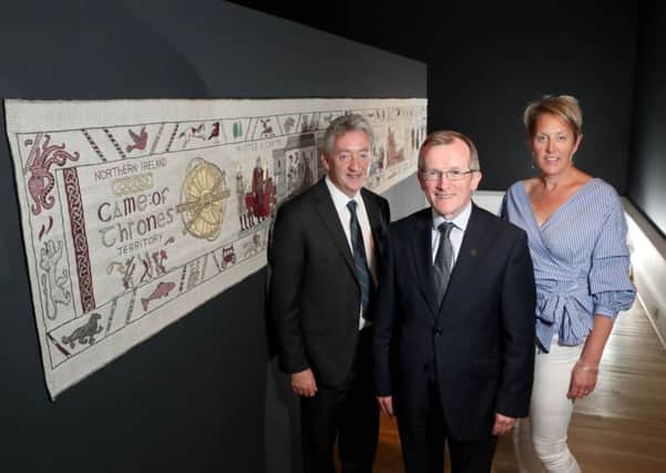 John McGrillen, CEO of Tourism NI; Niall Gibbons, CEO of Tourism Ireland; and Kathryn Thomson, CEO of the Ulster Museum, at the unveiling of the Game of Thrones tapestry. Pic by William Cherry, Presseye
