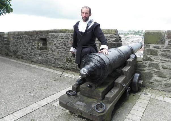 An actor dressed as Rev James McGregor on Londonderry's city walls, at the 2015 Ulster Scots Festival. Picture by Kenneth Allen. CC.