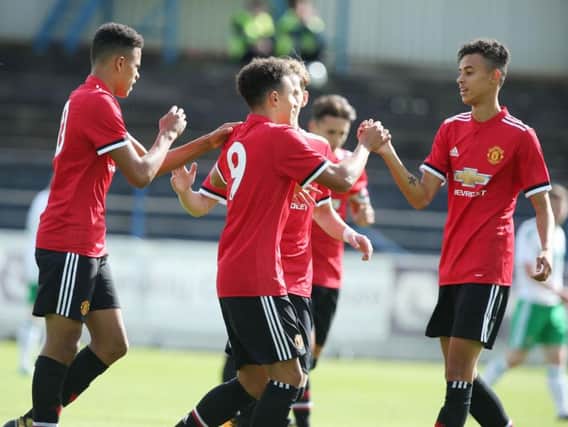 Manchester United's Nishan Burkart celebrates scoring against Northern Ireland during Saturday's SupercupNI Challenge Cup match at the Coleraine Showgrounds.