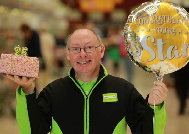 Asda colleague, James Prentice, celebrates 25 years of service with the company.
