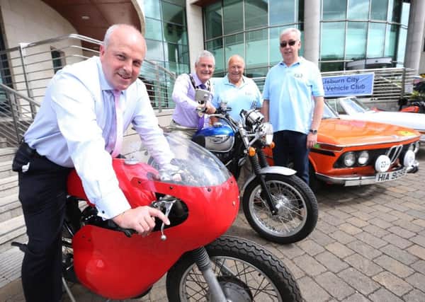 Pictured at the launch of the UGP Bike Week Vintage Car & Bike Parade are Alderman James Tinsley, Chairman of the council's Leisure & Community Development Committee, and Mayor Tim Morrow with Sammy Spence (Chairman) and Syd McCoy (Secretary) of Lisburn City Old Vehicle Club.