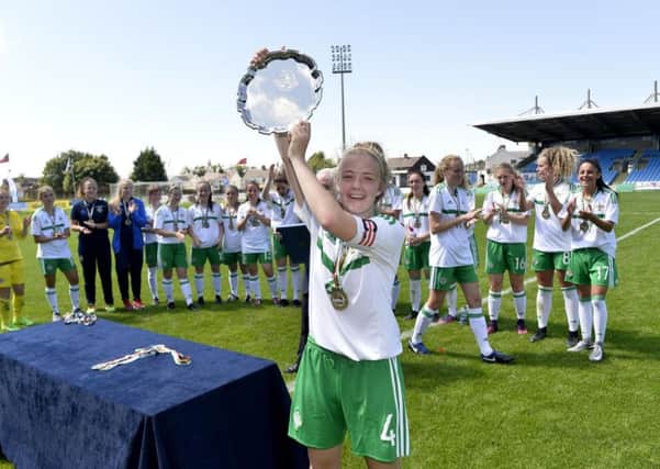 Northern Ireland's captain Emma McMaster 
with the team
