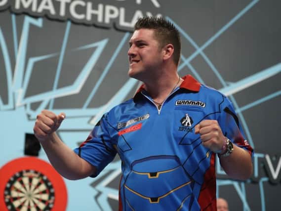 Daryl Gurney celebrates his win over Gary Anderson.