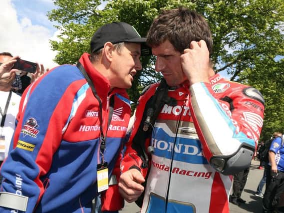 Guy Martin with John McGuinness at the Isle of Man TT.