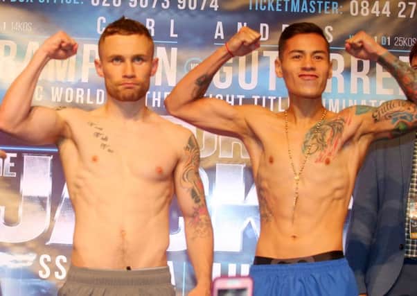 Carl Frampton and Andres Gutierrez pictured at the weigh-in at the Europa Hotel on Friday.