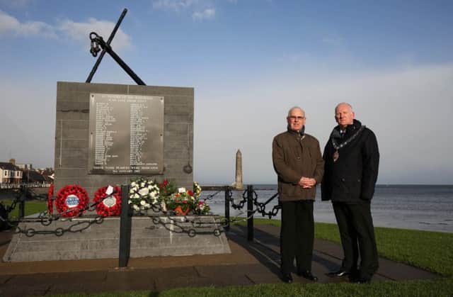William (Billy) McAllister at the Princess Victoria memorial in Larne in January 2016 with the then Mayor of Mid and East Antrim Borough, Councillor Billy Ashe.   They were pictured at the 63rd annual anniversary commemoration service held each year to mark the disaster. Picture: Darren Kidd / PressEye