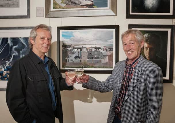Painters Alan Duke and Brian Coulter raise a glass to celebrate the opening of their joint exhibition at the Arcadia, Portrush. The exhibition runs throughout August.

Â©2017Derek Simpson: www.sportfile.co.uk