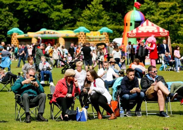 Crowds relaxing in the sunshine at party In The Park. (Submitted Pictures).