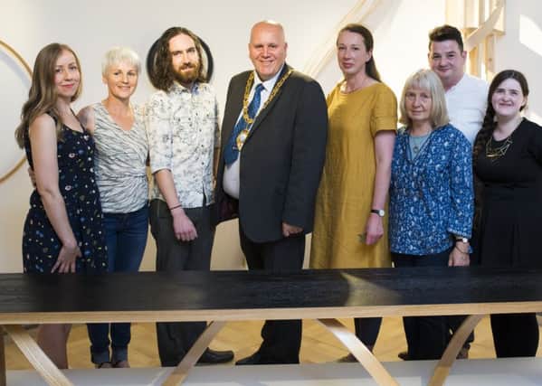 Ballymena Mayor, Cllr Paul Reid with the six makers : (l-r) : Nicola Gates, Sheena Devitt, Ronan Lowery, Sharon Adams, Alison Fitzgerald, Peter Surginor and Sinead Breathnach-Cashell of NI Screen at the Film Makers Exhibition at Mid Antrim Museum, the Braid which officially launched August Craft Month. It is one of 200 events taking place during August Craft Month which is co-ordinated by Craft NI and supported by National Lottery funding through the Arts Council of Northern Ireland. For full details of August Craft Month visit augustcraftmonth.com