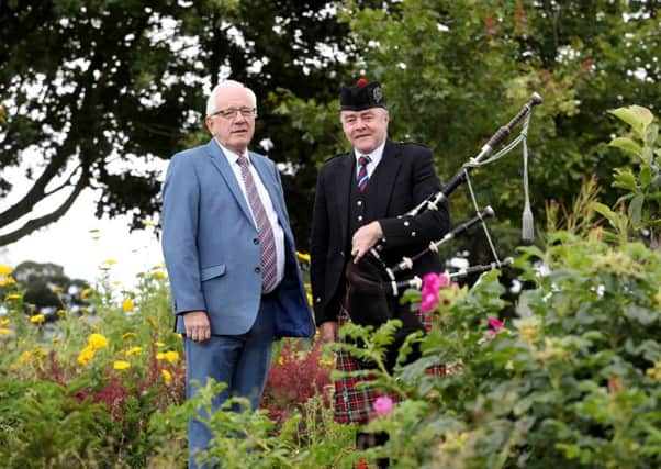 Alderman Allan Ewart MBE, Chairman of the council's Development Committee, with Ian Burrows, Project Manager at RSPBANI, promoting the upcoming Pipe Band Championships in Moira on Saturday, August 5.