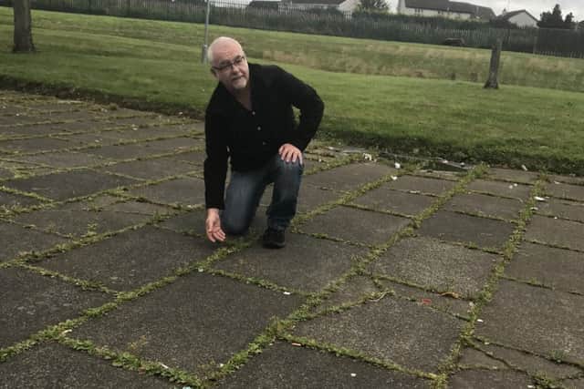 Liam Mackle expresses concerns over weeds in Taghnevan.